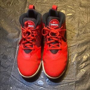 Nike Team Hustle Red and Black Sneakers